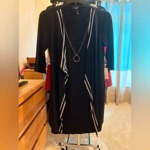 Elegant Black Dress with White Trim